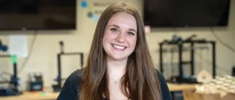 A smiling young woman.